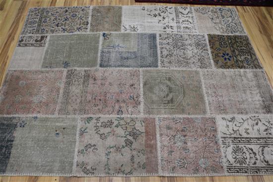 A patch work rug, 220 x 170cm